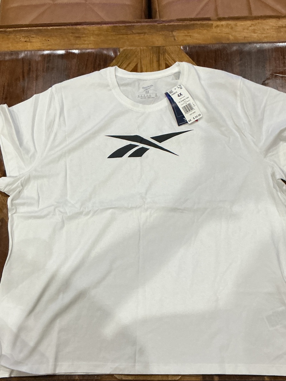 Plus size Reebok White Short Sleeve Crew Neck Tee with Black Vector Logo